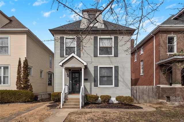 4137 Juniata St, Saint Louis, MO 63116 - view of front of house with fence and roof with shingles