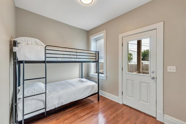 920 Talmage, Saint Louis, MO 63110 - bedroom featuring baseboards and wood finished floors