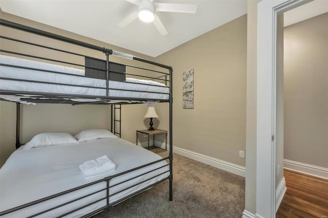 bedroom with baseboards and a ceiling fan