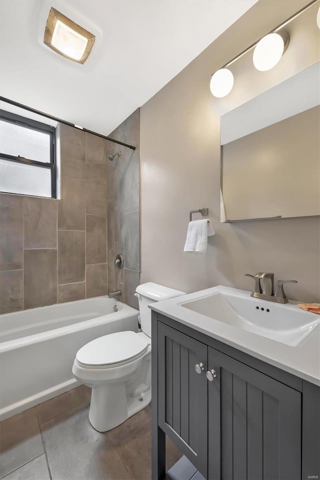 full bathroom with toilet, shower / tub combination, tile patterned flooring, and vanity