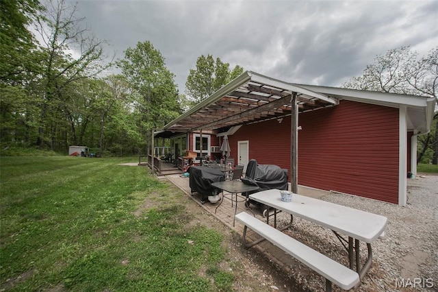 12455 Jefferys Pl, Rolla, MO 65401 - back of house featuring a yard, a pergola, and a patio