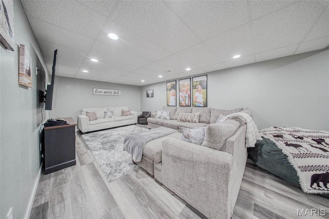 12455 Jefferys Pl, Rolla, MO 65401 - living area with wood finished floors and a drop ceiling