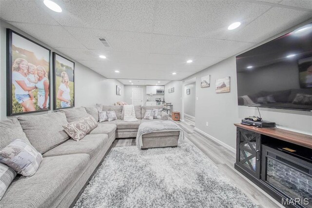 12455 Jefferys Pl, Rolla, MO 65401 - living area with wood finished floors and baseboards