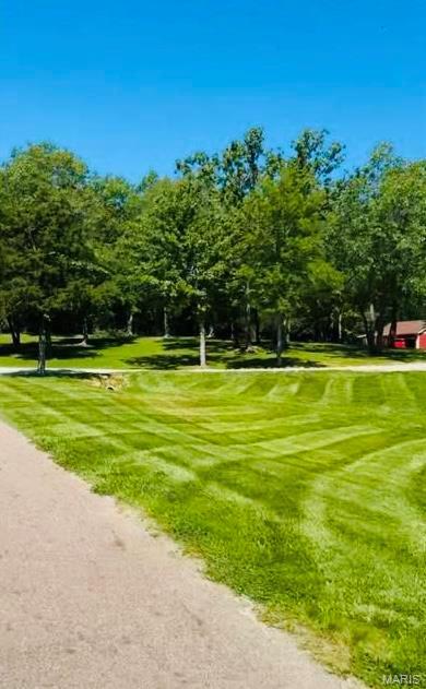 12455 Jefferys Pl, Rolla, MO 65401 - surrounding community featuring a yard