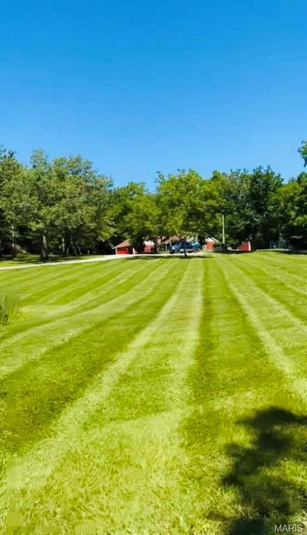 12455 Jefferys Pl, Rolla, MO 65401 - view of property's community with view of wooded area