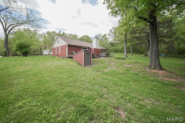 12455 Jefferys Pl, Rolla, MO 65401 - view of green lawn featuring a wooden deck