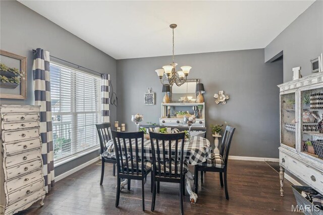8038 Fox Holw, Barnhart, MO 63012 - dining area with a chandelier, dark wood-style floors, and baseboards