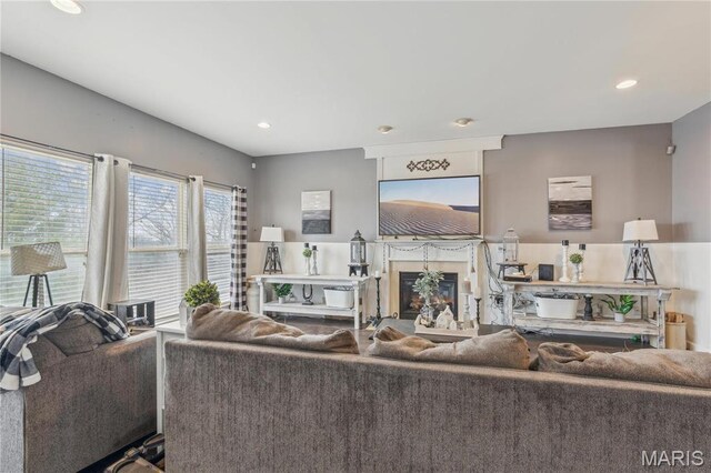 8038 Fox Holw, Barnhart, MO 63012 - living room with a glass covered fireplace and recessed lighting