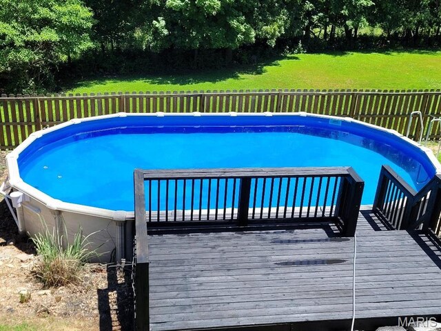 8038 Fox Holw, Barnhart, MO 63012 - view of pool with a wooden deck