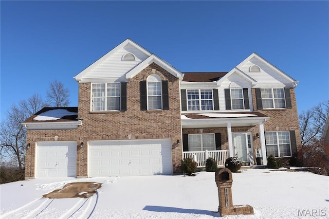 8038 Fox Holw, Barnhart, MO 63012 - traditional-style home featuring covered porch, brick siding, and a garage