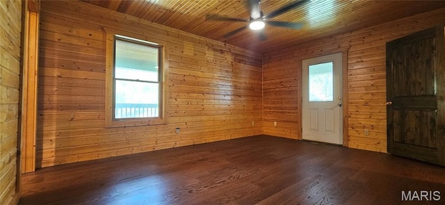 12124 Hamilton Hollow Rd, Sullivan, MO 63080 - unfurnished room with ceiling fan, dark wood-type flooring, wood walls, and wooden ceiling