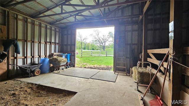 12124 Hamilton Hollow Rd, Sullivan, MO 63080 - misc room with lofted ceiling, concrete flooring, and a garage