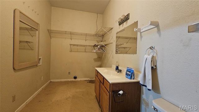 12124 Hamilton Hollow Rd, Sullivan, MO 63080 - laundry room with a sink and baseboards