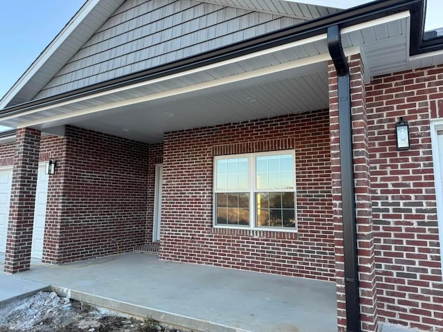 view of home's exterior featuring brick siding