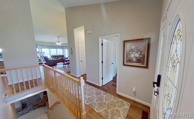 112 Summit Rdg, Maryville, IL 62062 - entryway featuring wood finished floors, baseboards, ceiling fan, and high vaulted ceiling