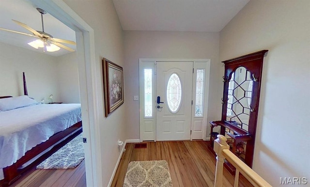 112 Summit Rdg, Maryville, IL 62062 - foyer with wood finished floors, a ceiling fan, and baseboards