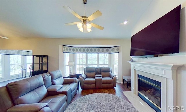 112 Summit Rdg, Maryville, IL 62062 - living room with healthy amount of natural light, ceiling fan, a premium fireplace, wood finished floors, and vaulted ceiling