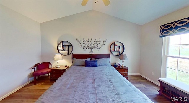 112 Summit Rdg, Maryville, IL 62062 - bedroom with wood finished floors, vaulted ceiling, baseboards, and a ceiling fan