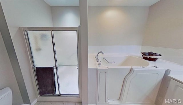112 Summit Rdg, Maryville, IL 62062 - full bath featuring toilet, a bath, a shower stall, and tile patterned floors