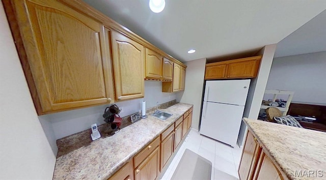 112 Summit Rdg, Maryville, IL 62062 - kitchen with freestanding refrigerator, a sink, light tile patterned floors, and recessed lighting