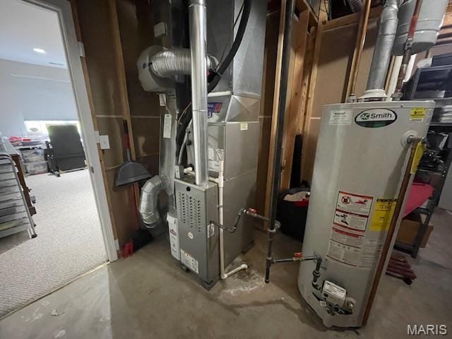 112 Summit Rdg, Maryville, IL 62062 - utility room with gas water heater and heating unit