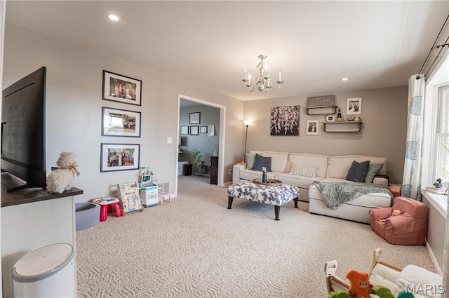 living area featuring carpet, a chandelier, recessed lighting, and baseboards