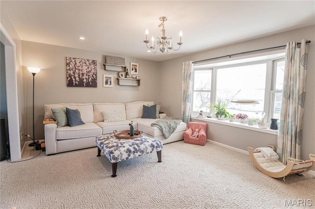 carpeted living area with a chandelier, baseboards, and recessed lighting