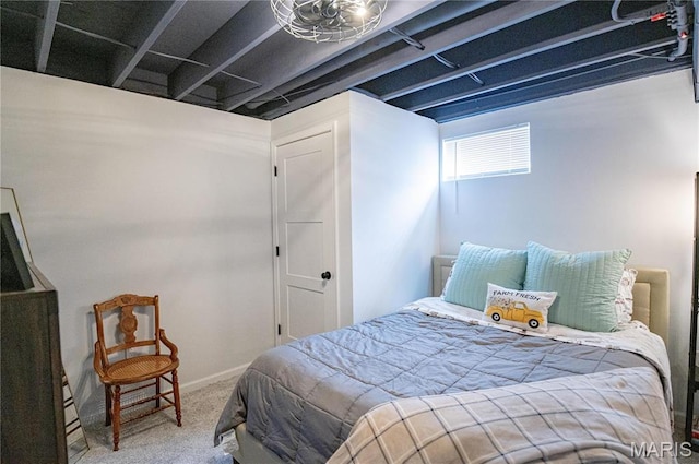 carpeted bedroom with baseboards