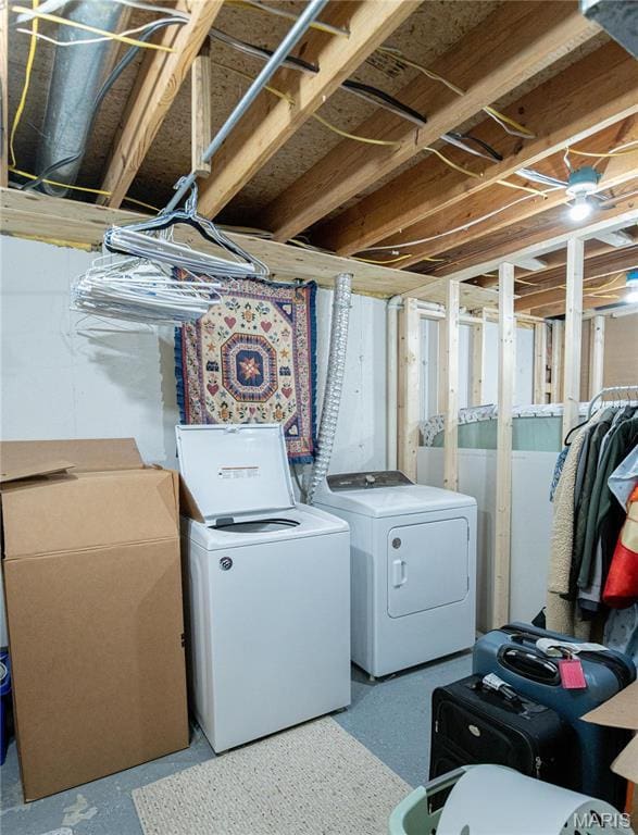washroom with washer and dryer