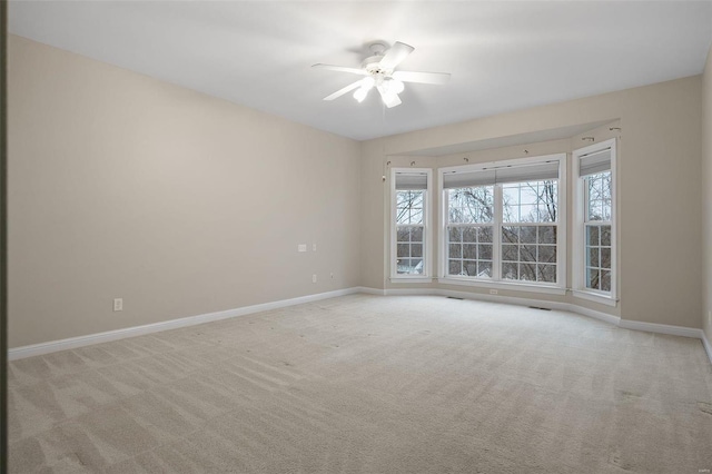 480 Ascot Manor Ct, Fenton, MO 63026 - empty room with carpet, baseboards, and ceiling fan