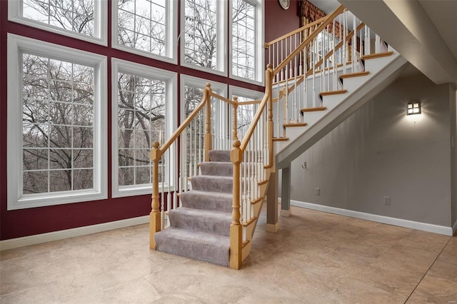 480 Ascot Manor Ct, Fenton, MO 63026 - stairway with baseboards and a towering ceiling