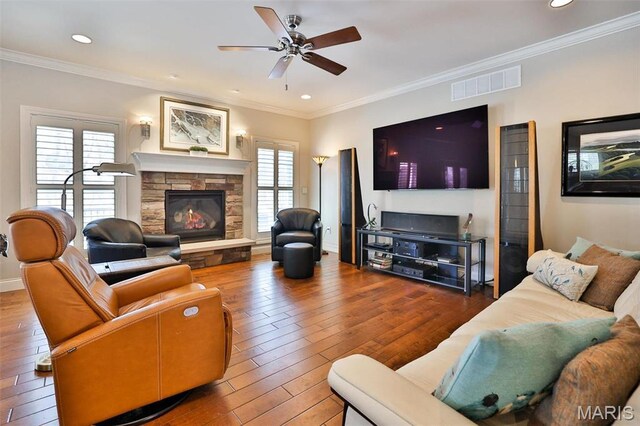 1120 Franklin Ave, Edwardsville, IL 62025 - living room featuring hardwood / wood-style flooring, a ceiling fan, ornamental molding, a fireplace, and recessed lighting