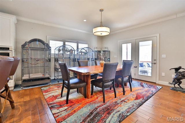 1120 Franklin Ave, Edwardsville, IL 62025 - dining space featuring wood-type flooring and crown molding