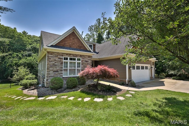 1120 Franklin Ave, Edwardsville, IL 62025 - craftsman-style house featuring stone siding, concrete driveway, a garage, and a shingled roof