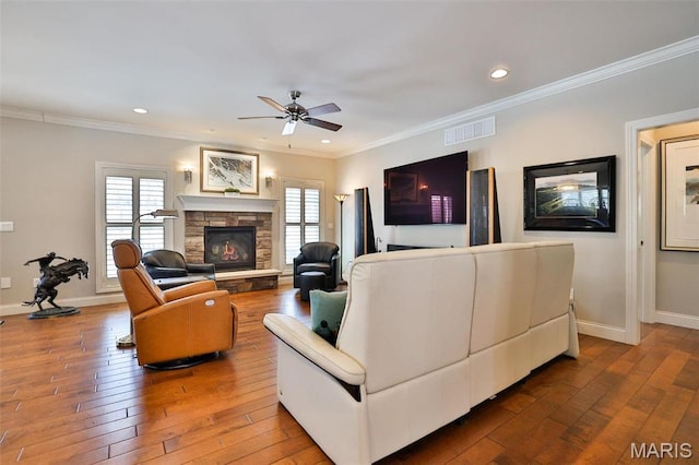 1120 Franklin Ave, Edwardsville, IL 62025 - living room with ceiling fan, hardwood / wood-style flooring, ornamental molding, recessed lighting, and a fireplace