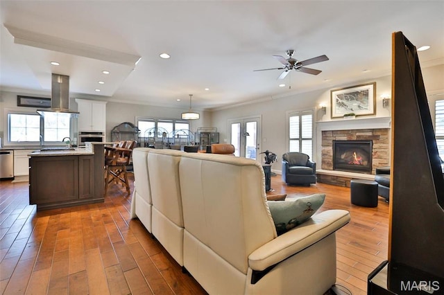 1120 Franklin Ave, Edwardsville, IL 62025 - living room featuring healthy amount of natural light, dark wood-type flooring, recessed lighting, and ornamental molding