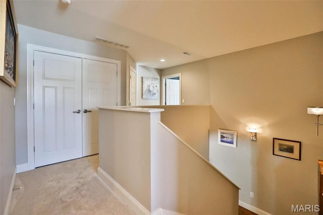 1120 Franklin Ave, Edwardsville, IL 62025 - hall featuring an upstairs landing, light colored carpet, and recessed lighting