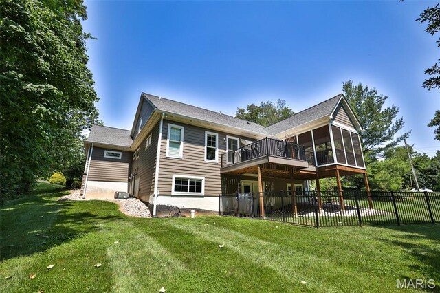1120 Franklin Ave, Edwardsville, IL 62025 - rear view of house featuring a sunroom and a wooden deck