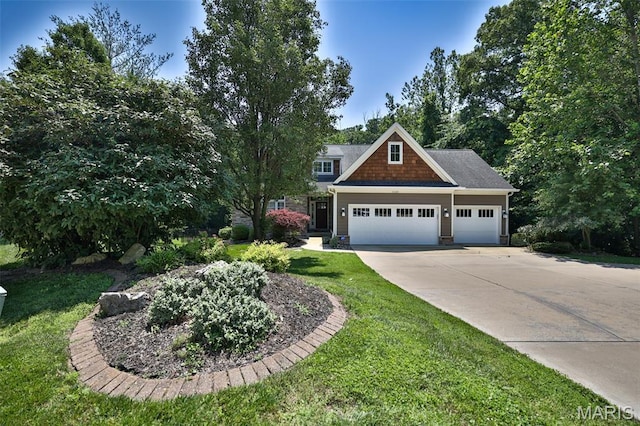 1120 Franklin Ave, Edwardsville, IL 62025 - craftsman inspired home with driveway, a garage, and a front yard