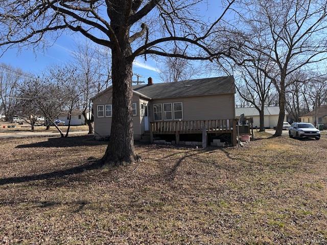 415 N Grand St, Willow Springs, MO 65793 - view of home's exterior with a wooden deck