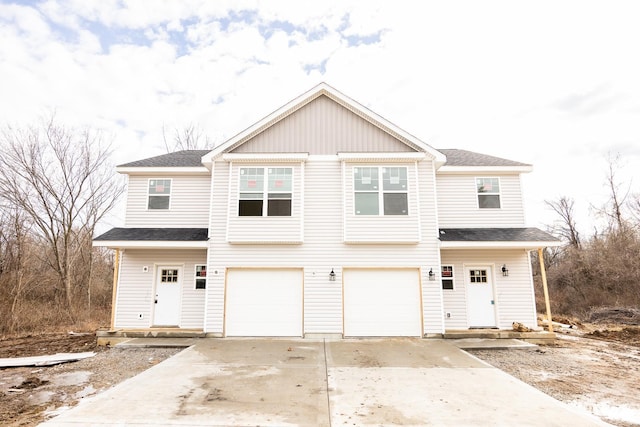 223 Shoreline Dr, Ofallon, IL 62269 - view of front facade with an attached garage, driveway, and roof with shingles