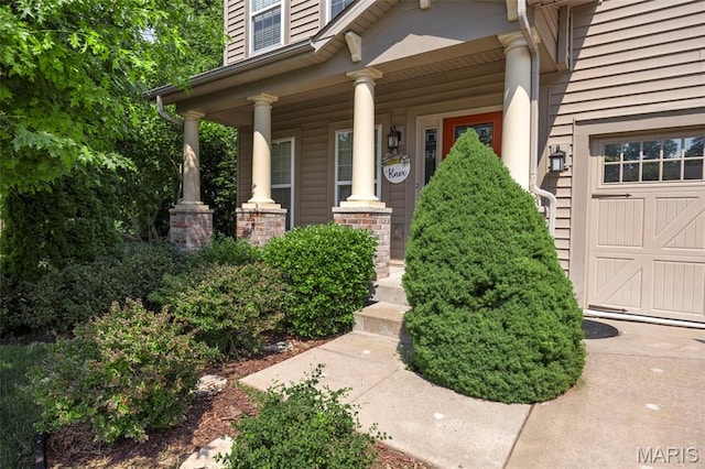 615 Derby Way Dr, Wentzville, MO 63385 - entrance to property featuring a porch and a garage