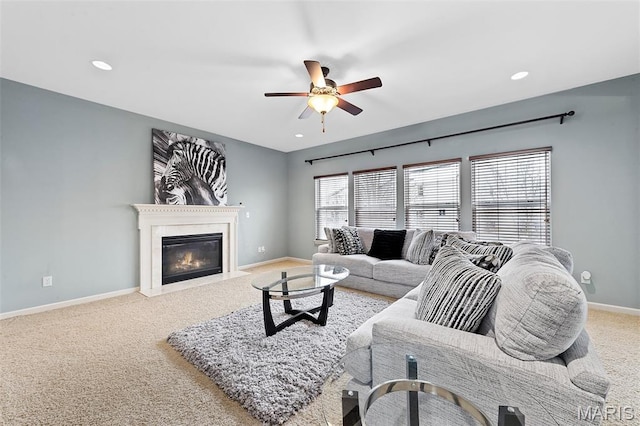 615 Derby Way Dr, Wentzville, MO 63385 - carpeted living area with a ceiling fan, a fireplace with flush hearth, and recessed lighting