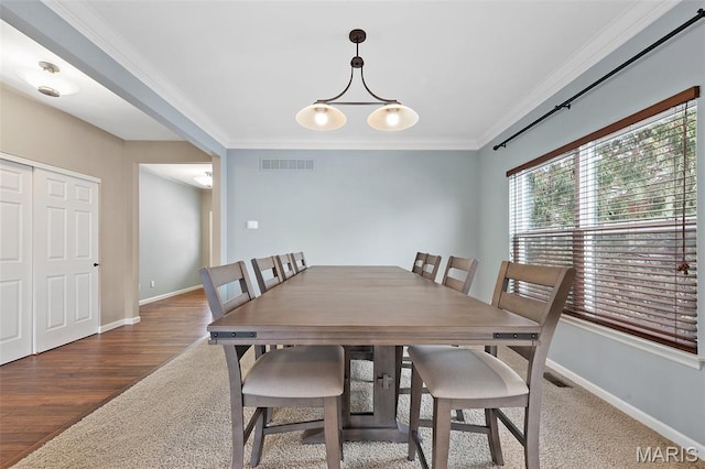 615 Derby Way Dr, Wentzville, MO 63385 - dining room featuring ornamental molding and wood finished floors