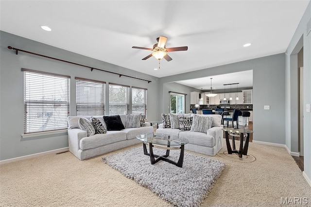 615 Derby Way Dr, Wentzville, MO 63385 - living area with ceiling fan, light carpet, and recessed lighting