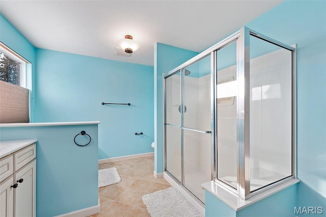 615 Derby Way Dr, Wentzville, MO 63385 - full bath featuring a stall shower, vanity, and tile patterned floors