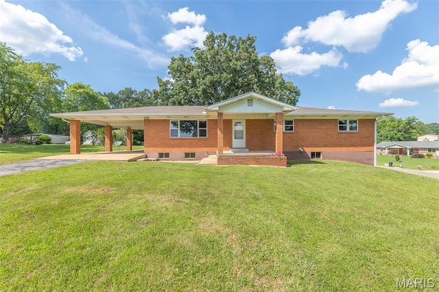 2125 Barron Rd, Poplar Bluff, MO 63901 - single story home with driveway, a carport, a front yard, and brick siding