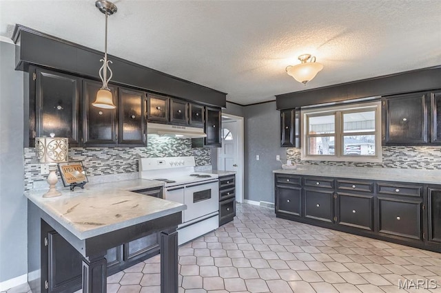 2125 Barron Rd, Poplar Bluff, MO 63901 - kitchen with electric stove, under cabinet range hood, backsplash, a textured ceiling, and decorative light fixtures