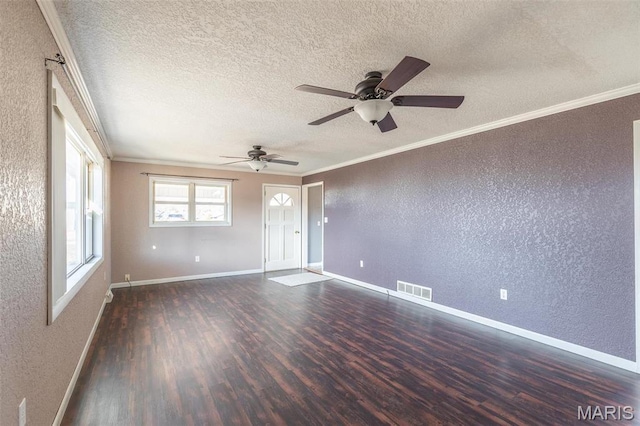 2125 Barron Rd, Poplar Bluff, MO 63901 - spare room featuring a textured wall, wood finished floors, a ceiling fan, ornamental molding, and a textured ceiling