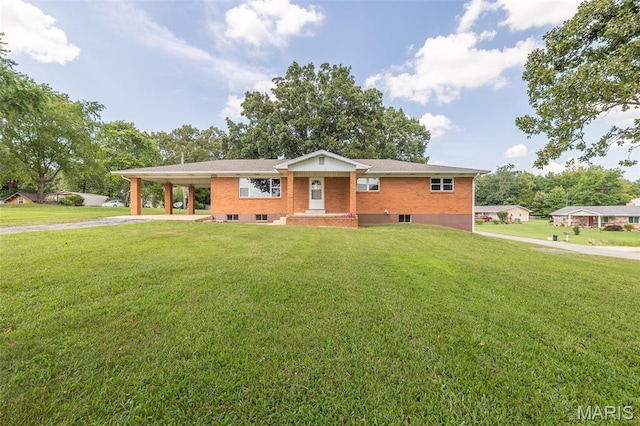 2125 Barron Rd, Poplar Bluff, MO 63901 - single story home with concrete driveway, a front lawn, an attached carport, and brick siding